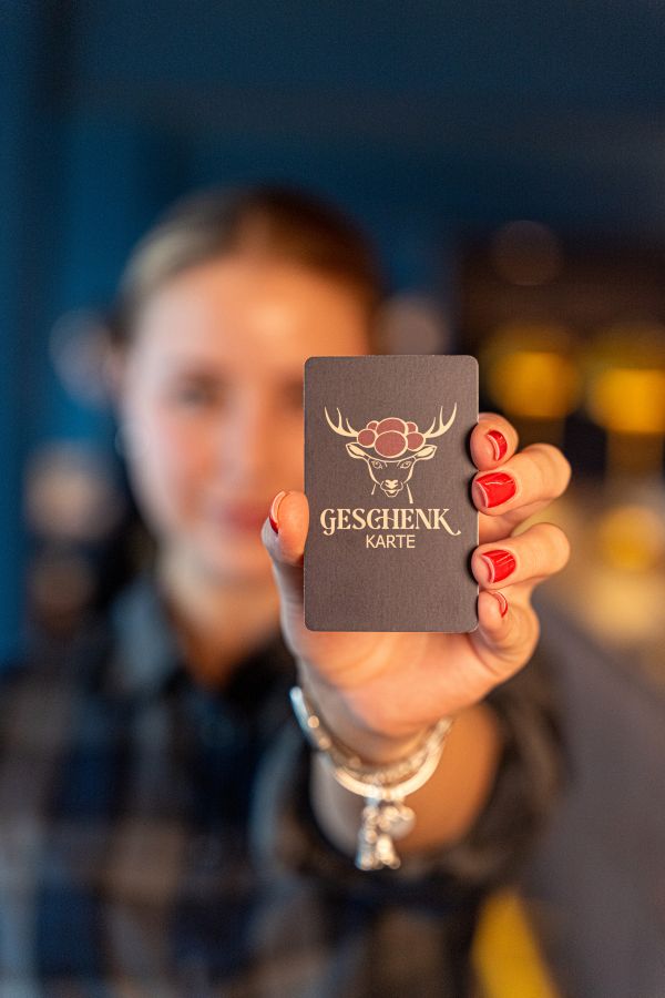 Restaurant‑Gutschein des Blümchen – Geschenkkarte mit Schwarzwald‑Motiv